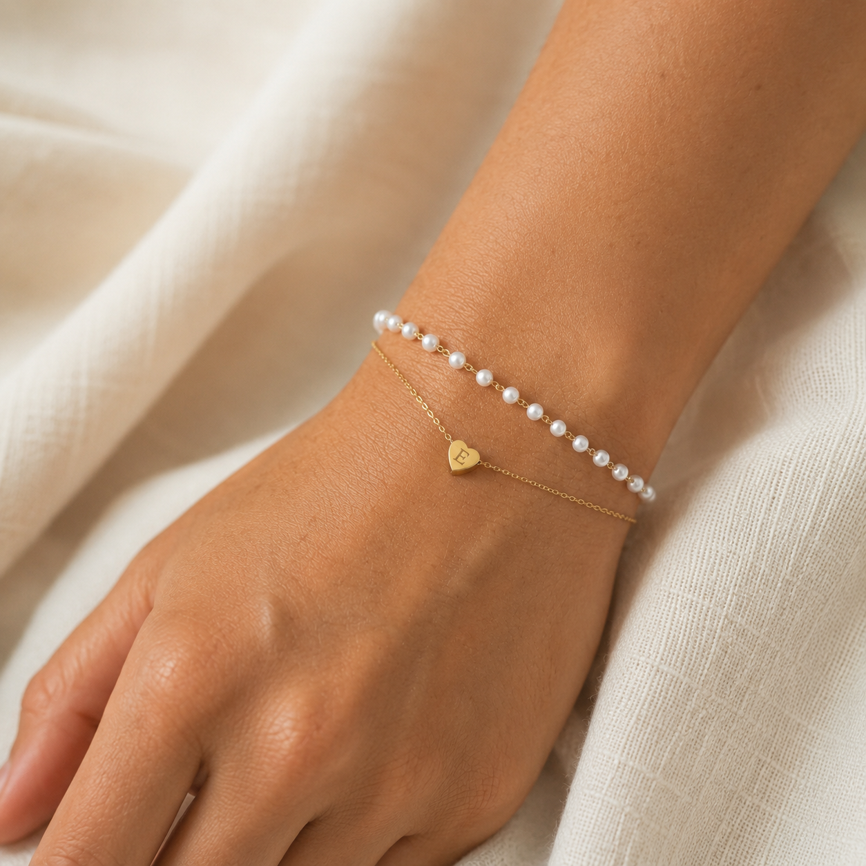 Personalized double-strand pearl bracelet with gold heart charm engraved initial, layered pearl and cable chain bracelet