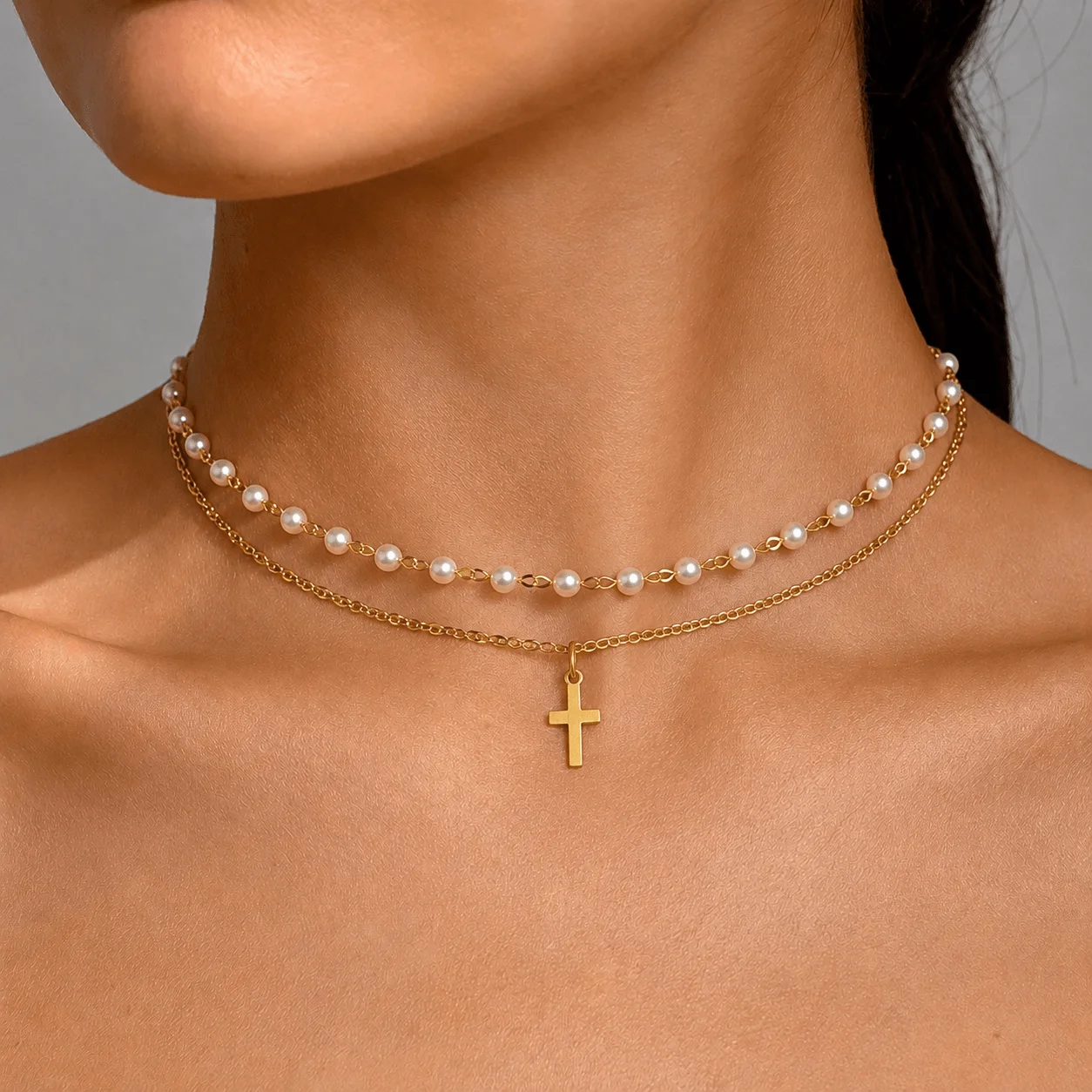 Layered pearl bead and gold chain choker necklace with cross pendant, dainty stainless steel design for women